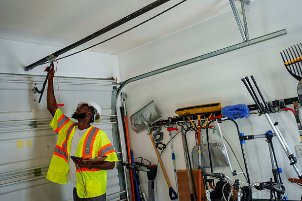 Professional Garage Door Panel Replacement technician working in Hennessey, OK